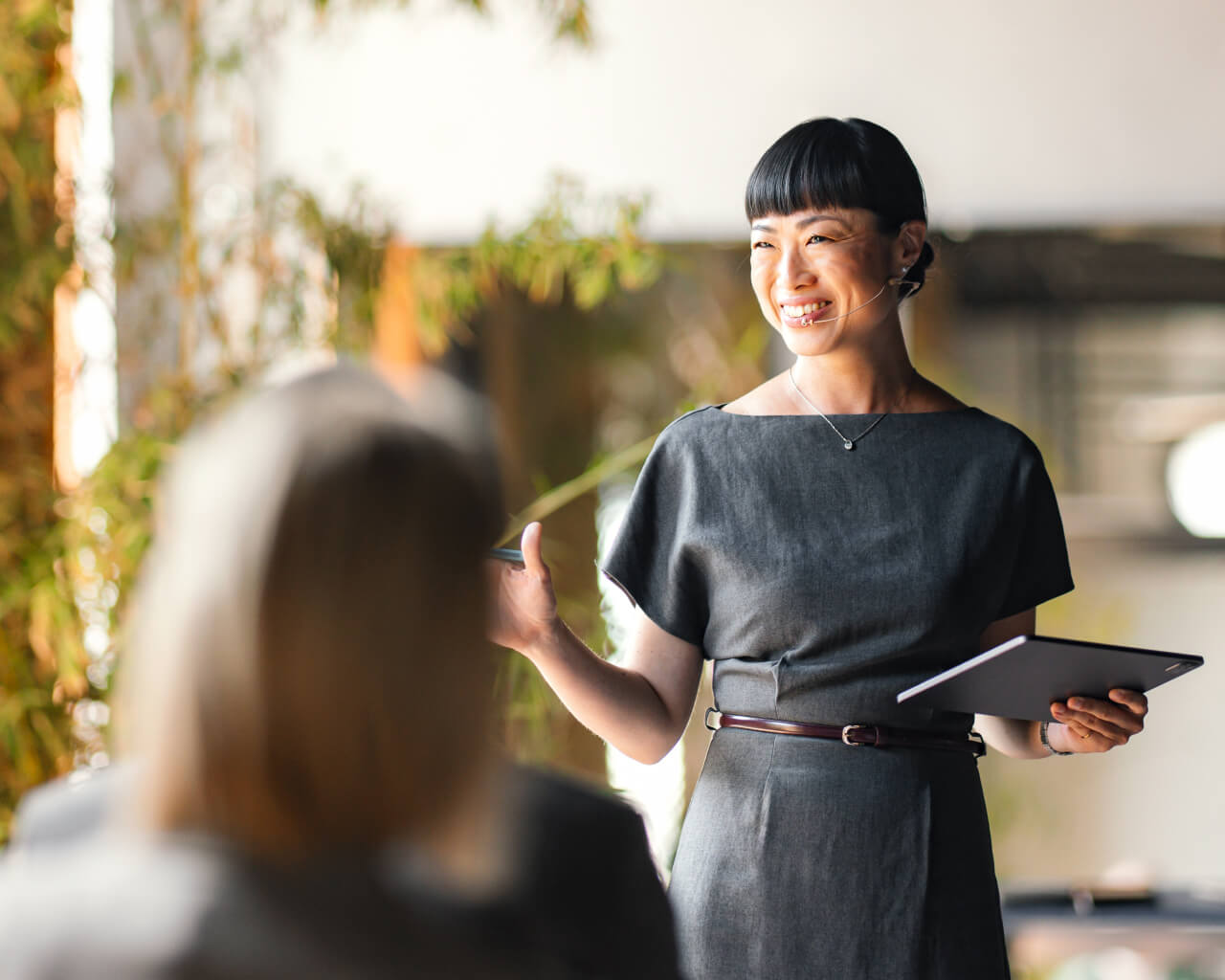Governance A business leader conducting a meeting.