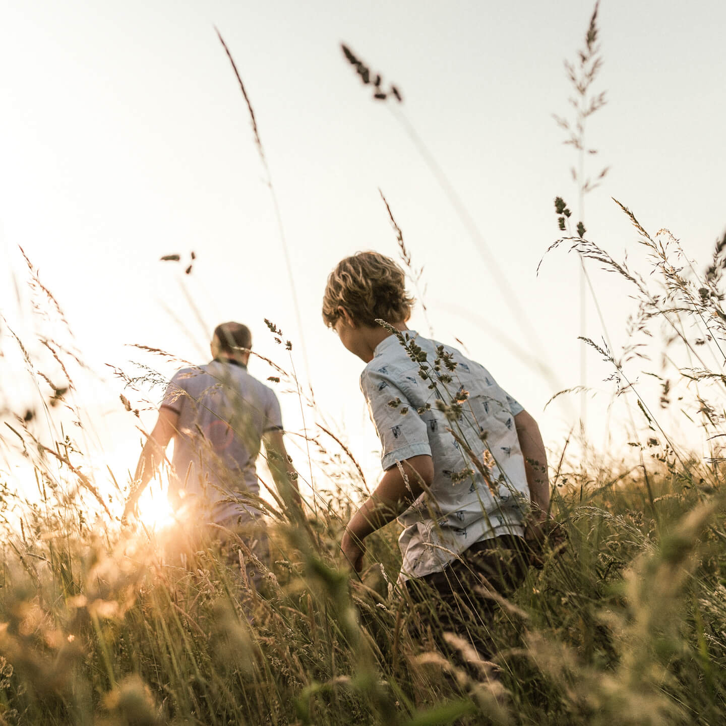 Father and son exploring nature