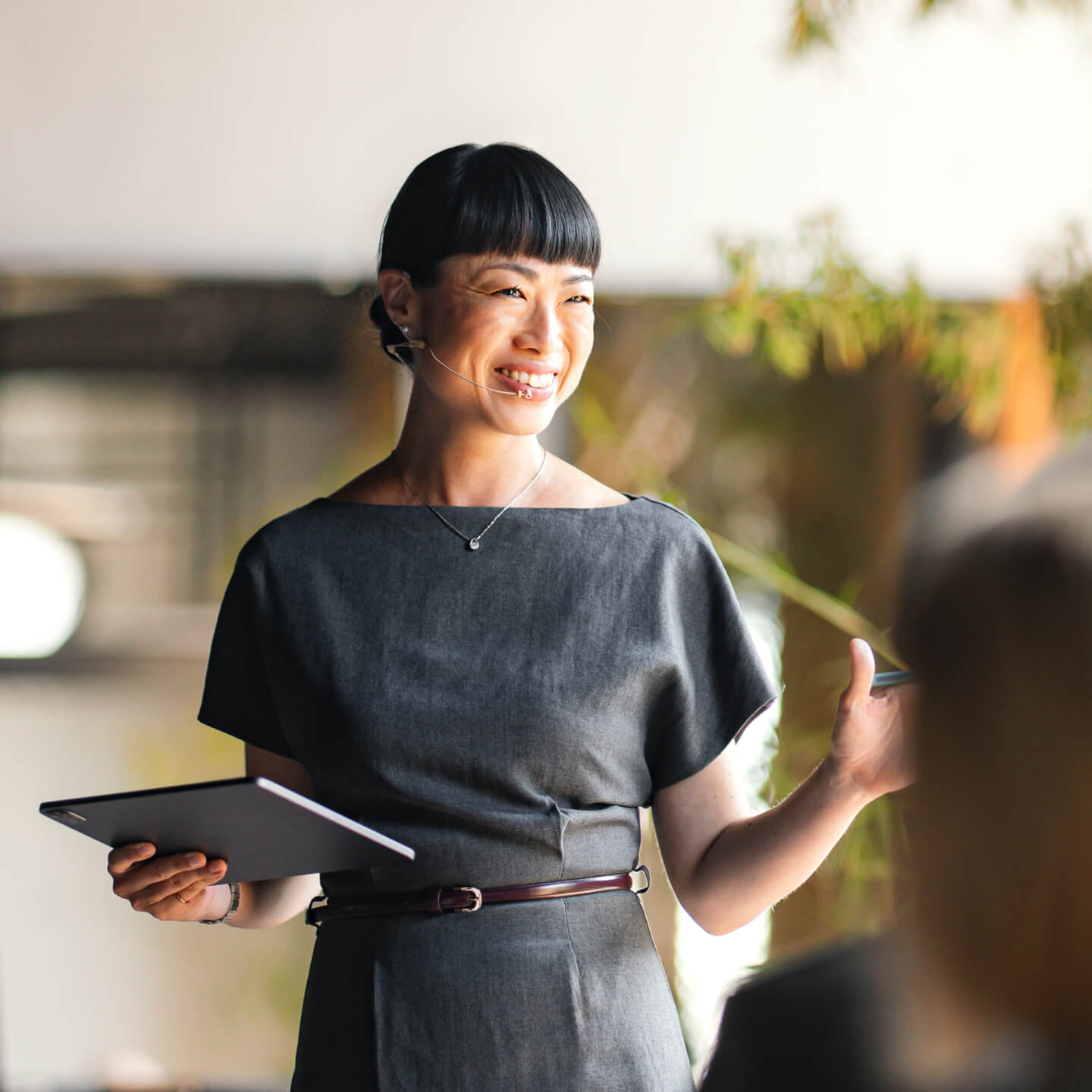 Female office worker presenting meeting