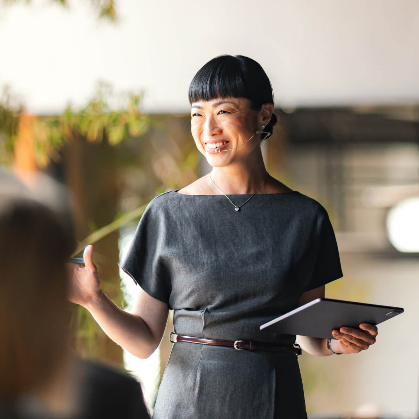 Female office worker presenting meeting