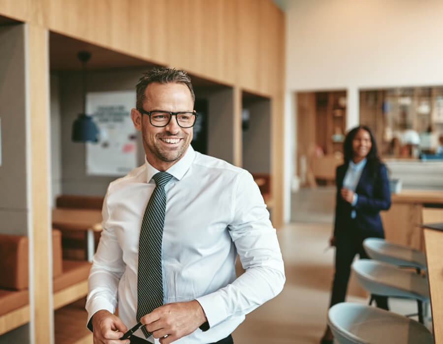 Two office workers walking to meeting
