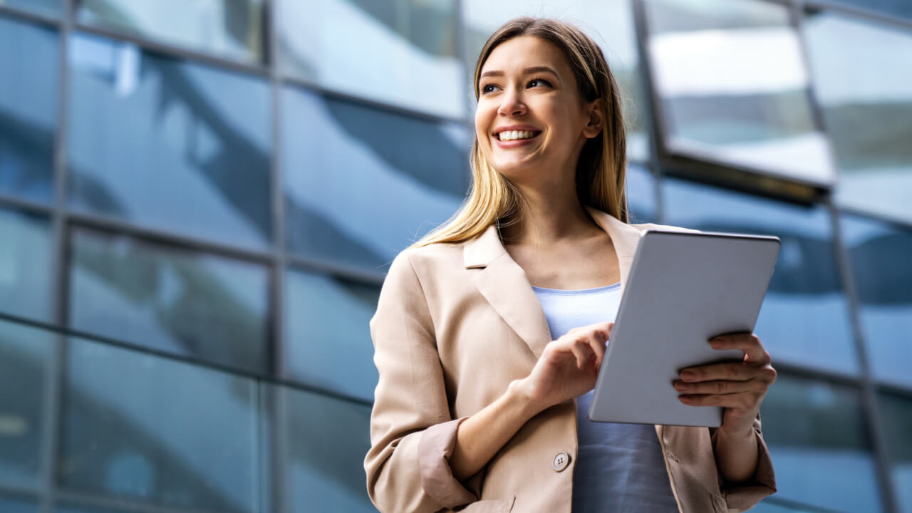 Investing your super when retirement is far away A lady standing in front of an office building