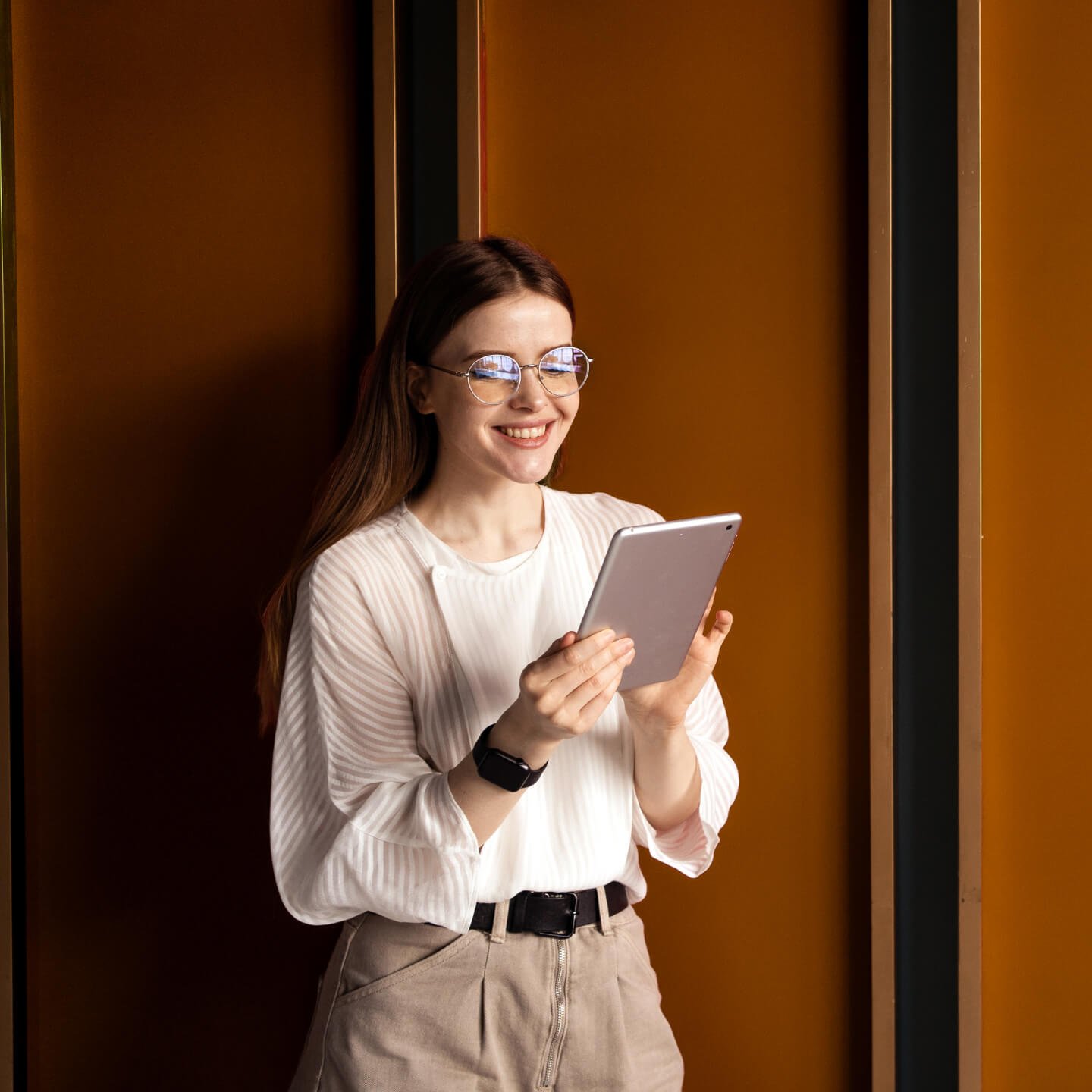 Woman doing work on tablet