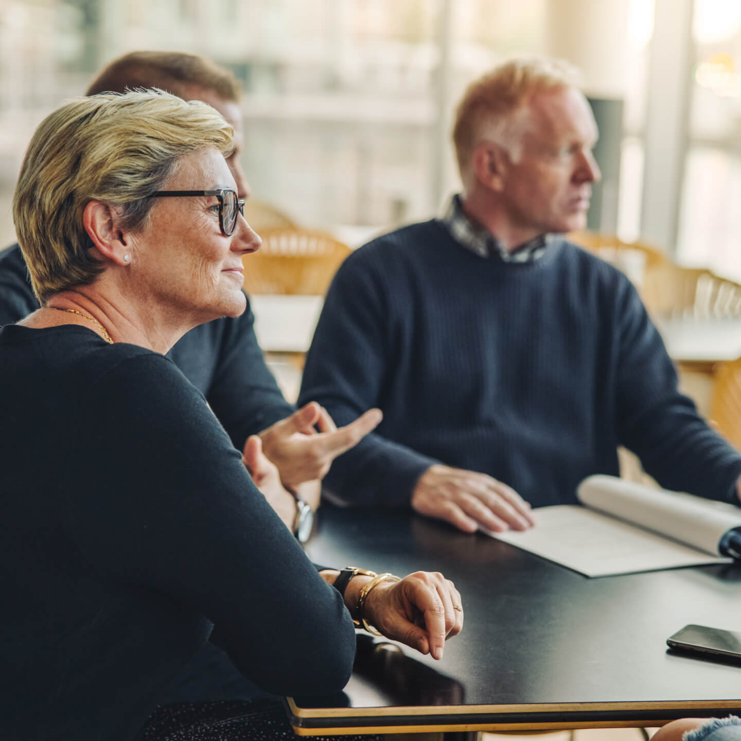 workers-in-office-having-meeting.jpg