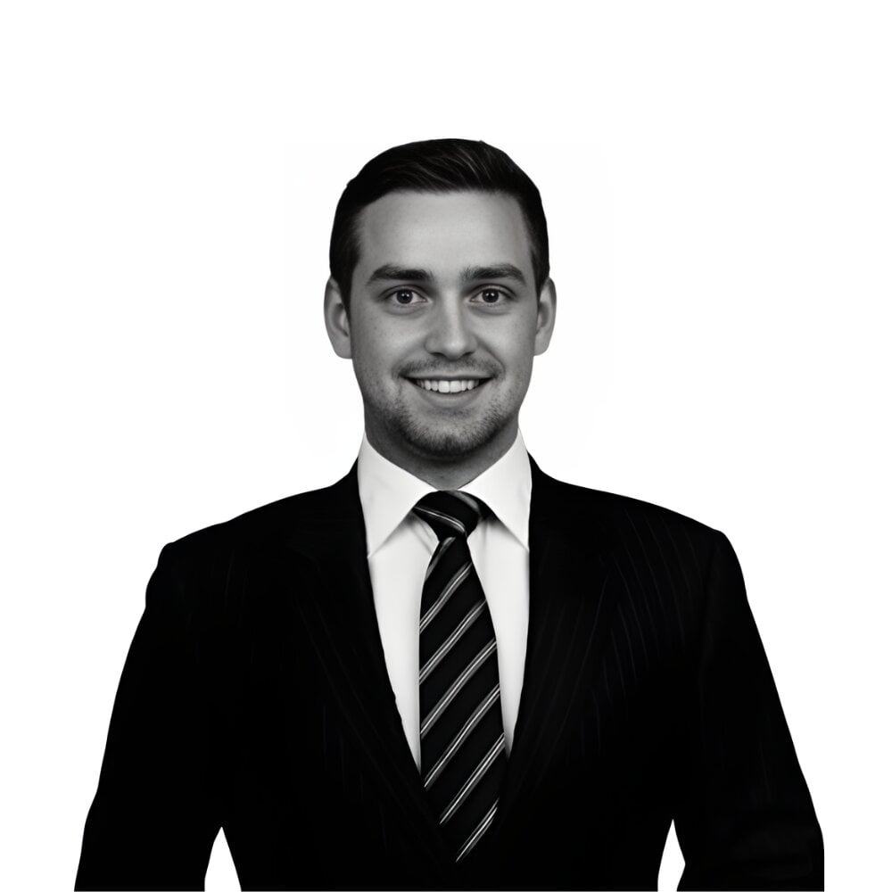 A headshot of Joel Tucker