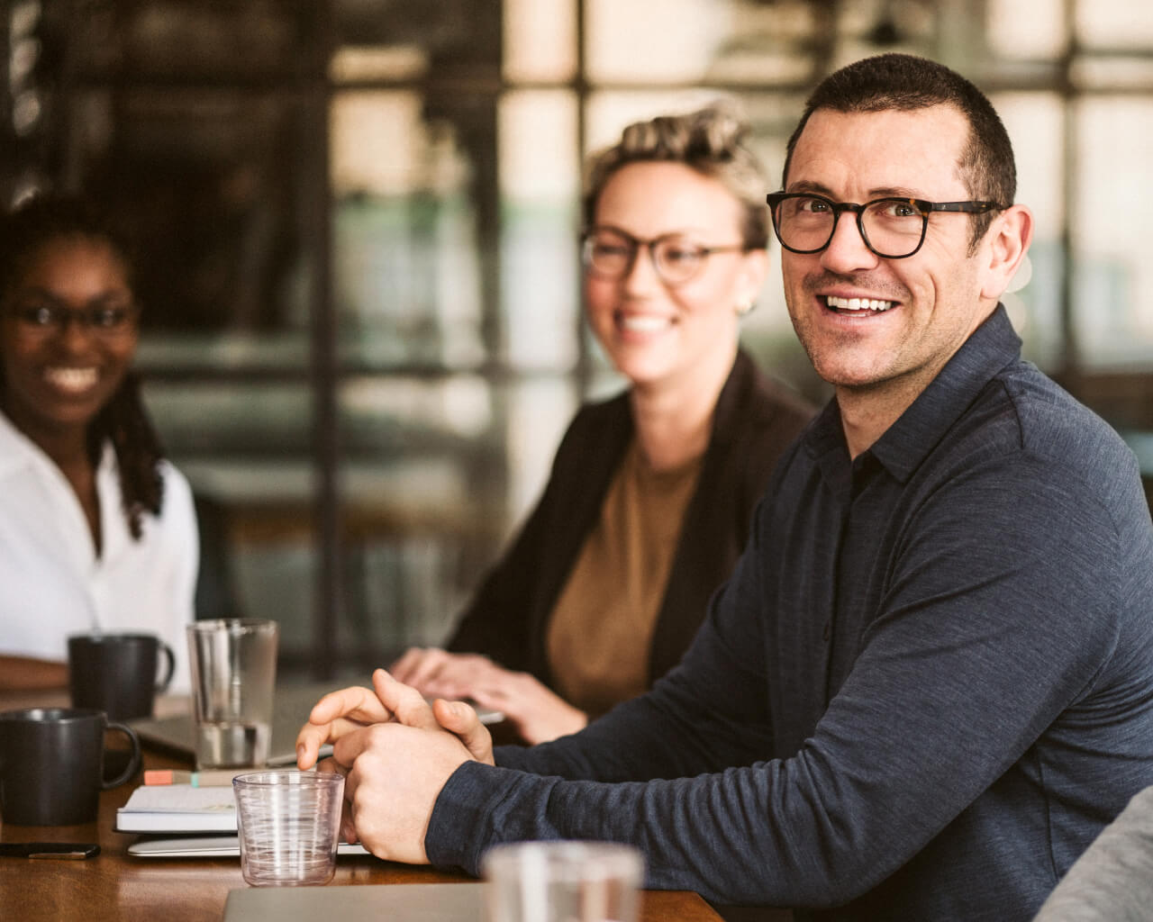Employers Team members having a meeting in the office.