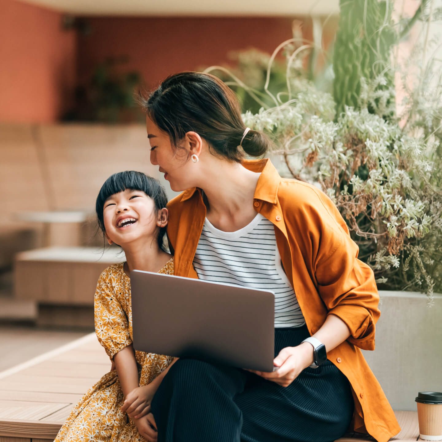Mother and child laughing