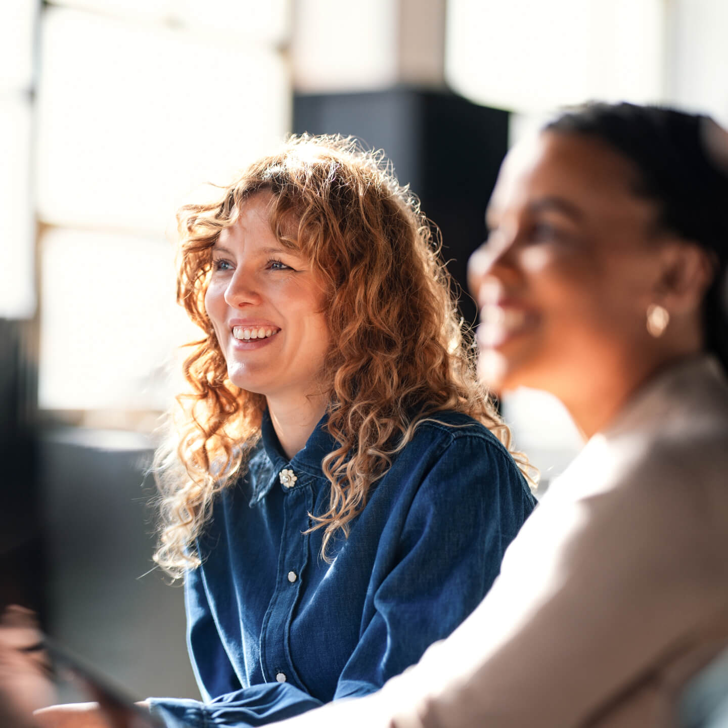 Two women in office