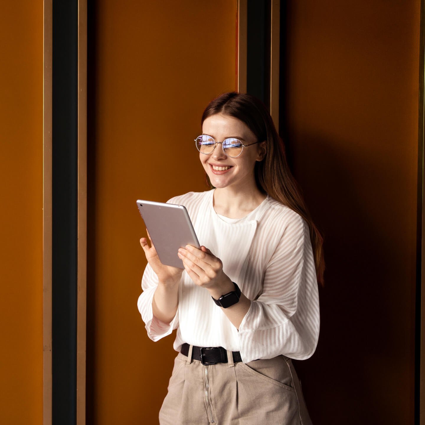 Woman doing work on tablet